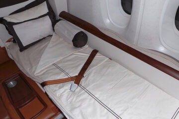 a seat belt on a bed