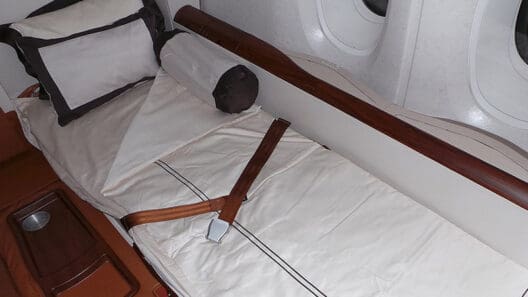 a seat belt on a bed