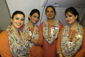 a group of women wearing matching scarves