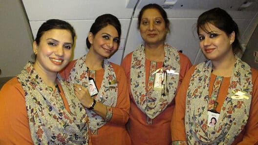 a group of women wearing matching scarves
