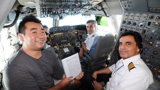a group of men in a plane