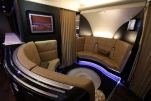 a room with a couch and a round table