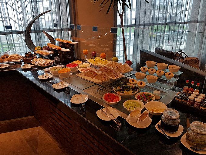 Oman Air Salalah Al Khareef Lounge food spread