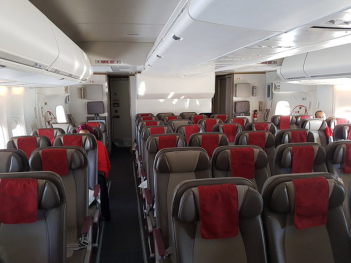a plane with seats and red seats