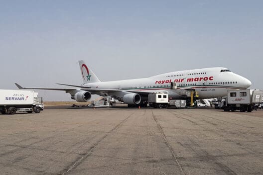 a large white airplane on a tarmac