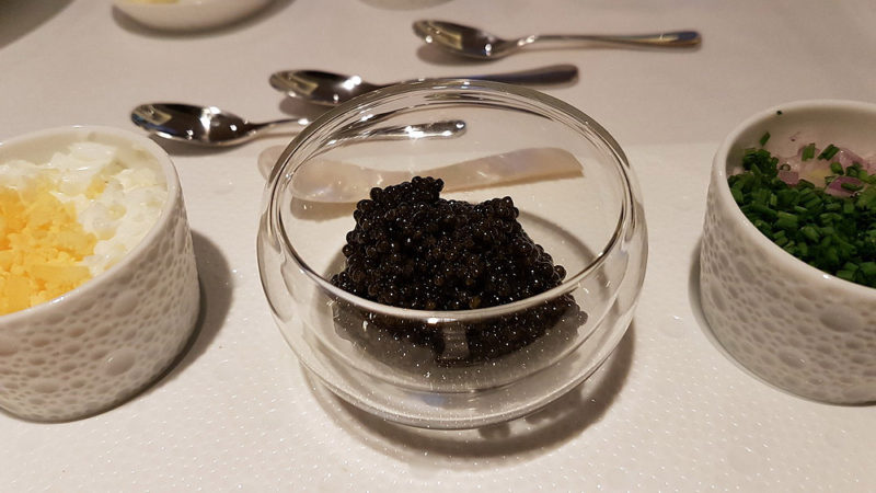 a bowl of black caviar