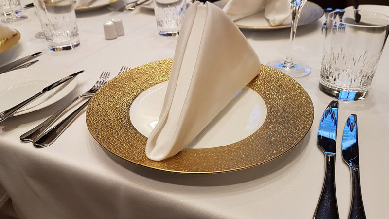 a plate with a folded napkin on it