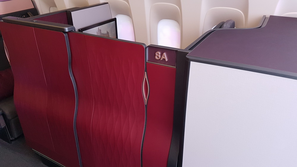 a red and white panel on an airplane