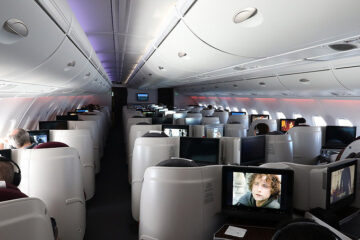 a plane with seats and monitors