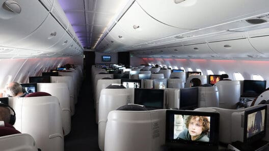 a plane with seats and monitors