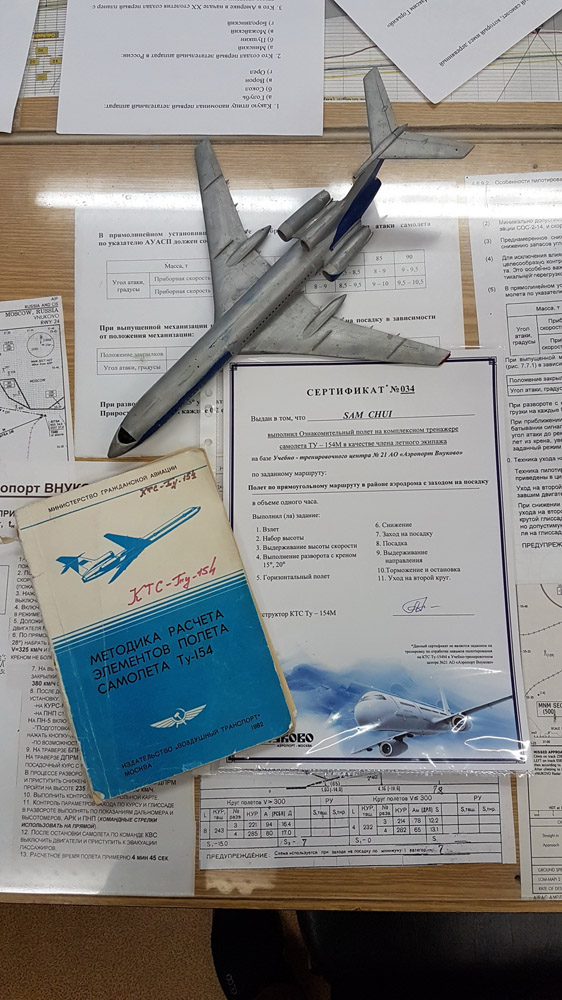 a model airplane and a document