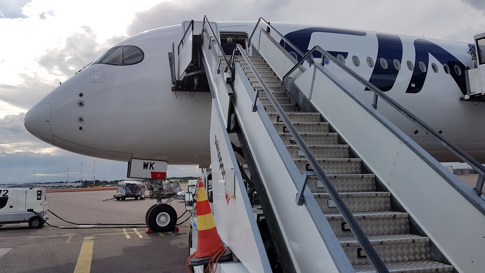 a plane with stairs going up to the side