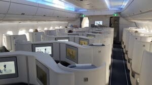 a plane with seats and screens