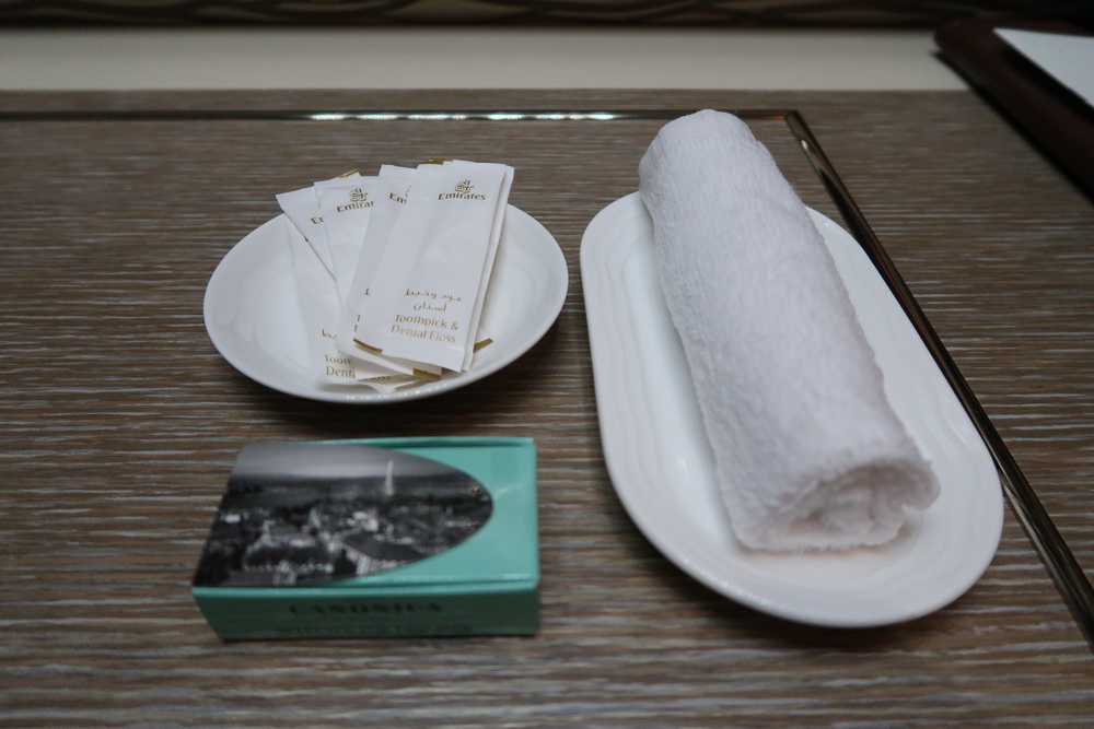 a plate with a towel and a napkin on it