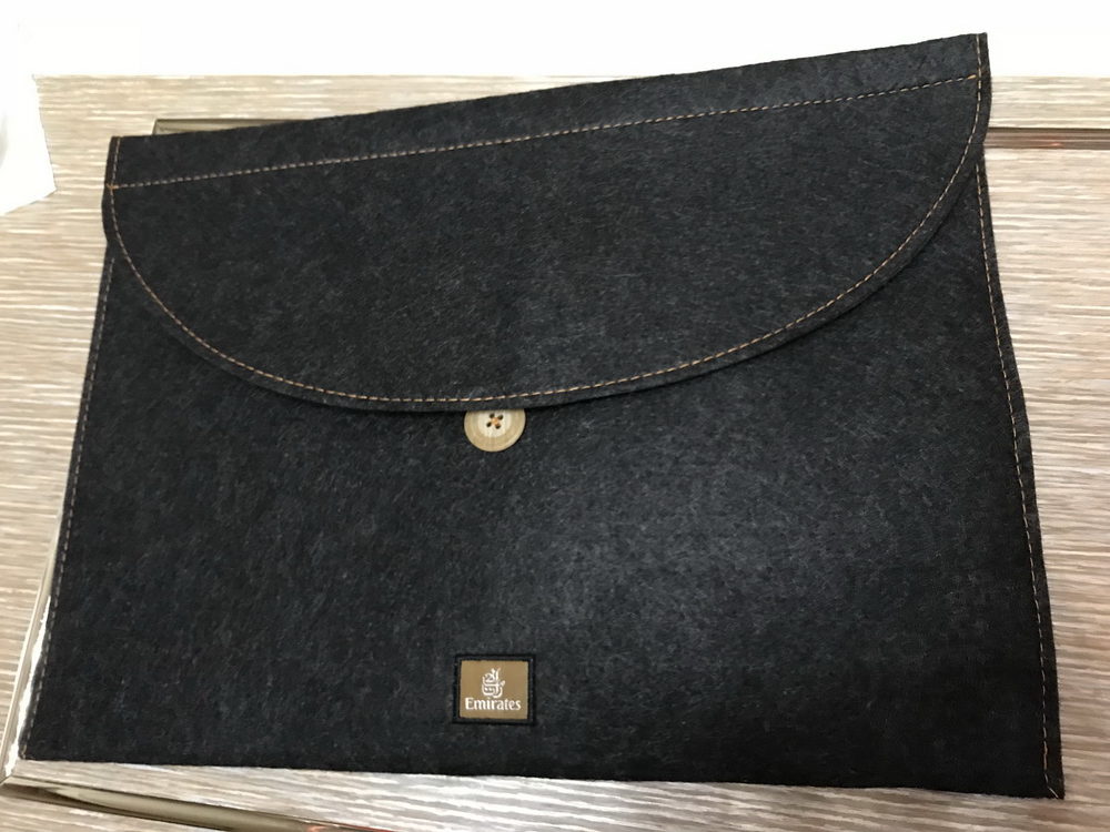 a black bag with a button