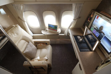 a desk and chair in an airplane