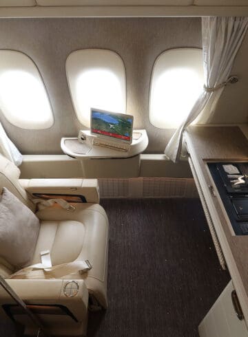 a desk and chair in an airplane