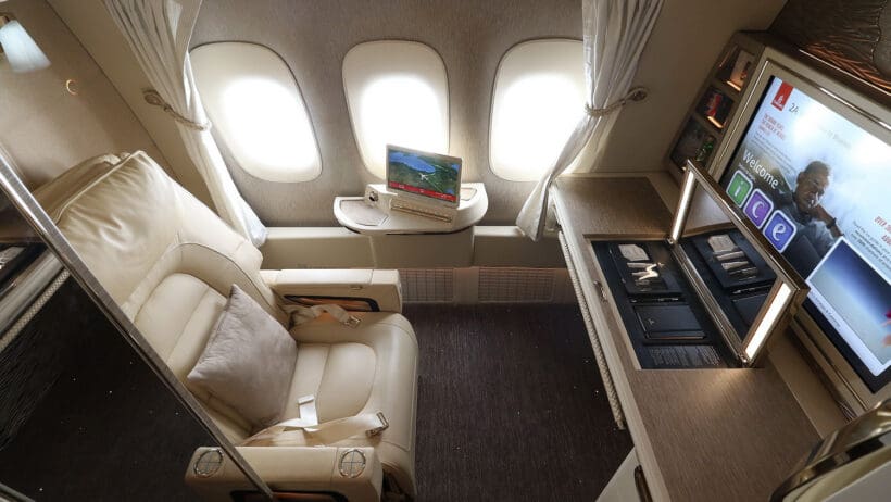 a desk and chair in an airplane