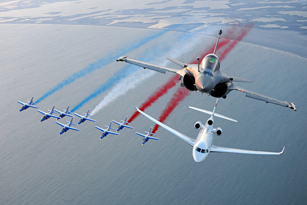 a group of airplanes flying in the sky