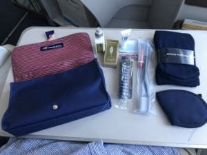 a table with a bag and other items on it