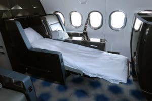 a bed in a plane