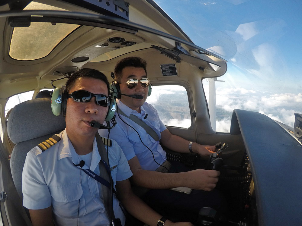 two men in a plane