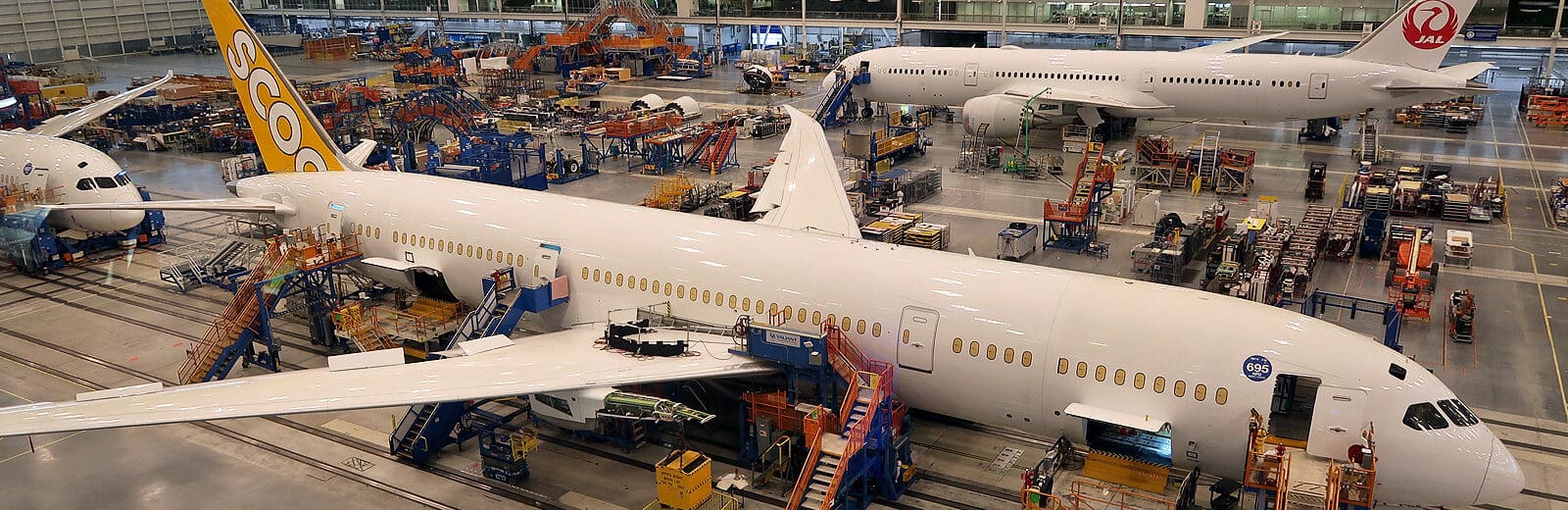 an airplane factory with many airplanes