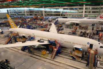 an airplane factory with many airplanes