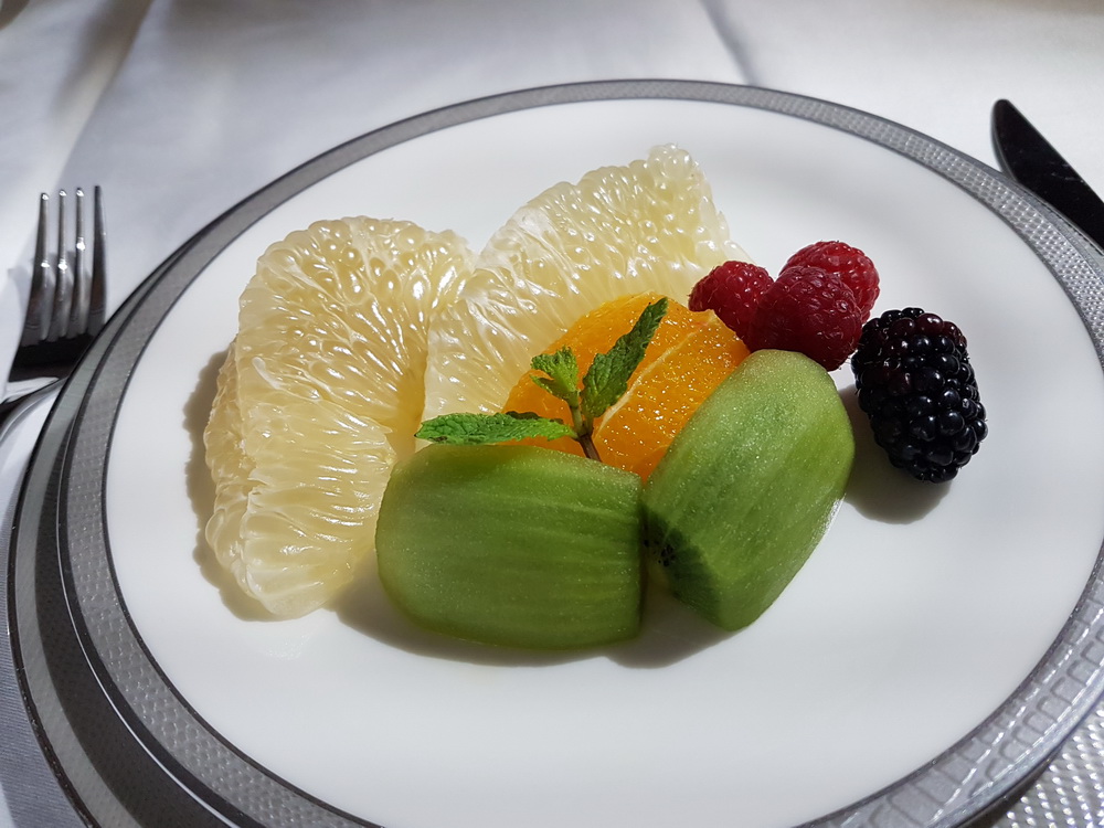 a plate of fruit on a table