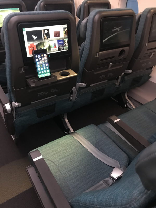 New Economy Class of Cathay Pacific with personal belonging holder