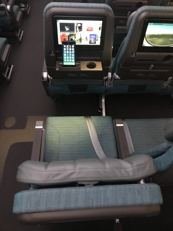 New Economy Class of Cathay Pacific with personal belonging holder