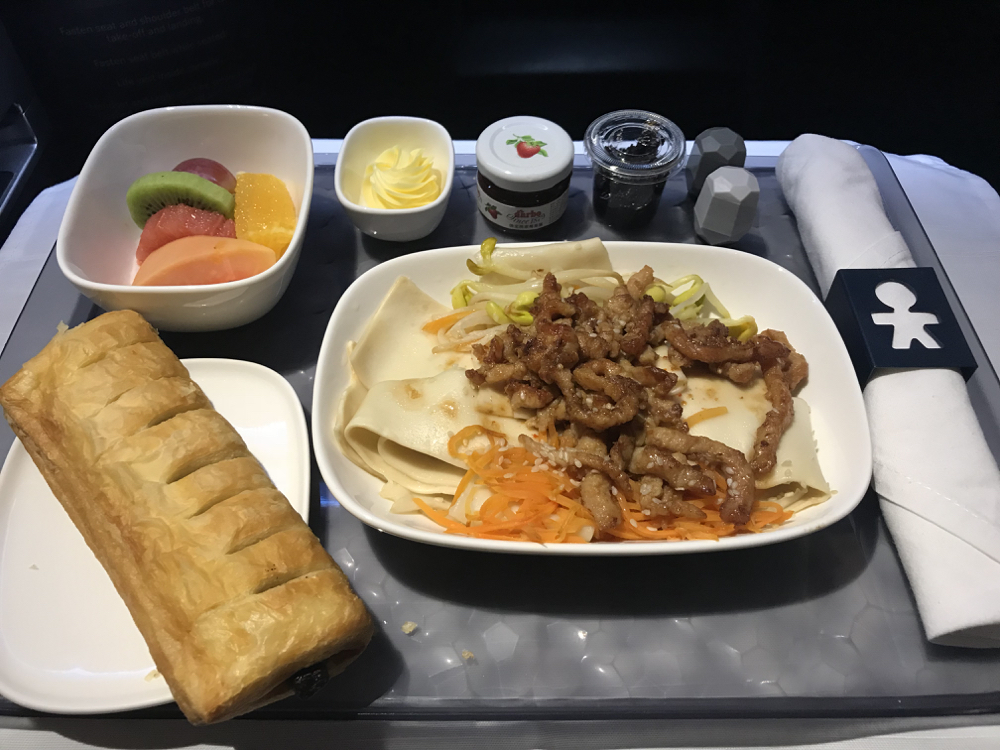 a plate of food on a tray