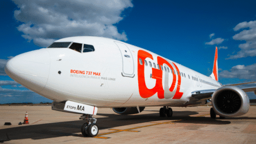 a white airplane with red letters on it