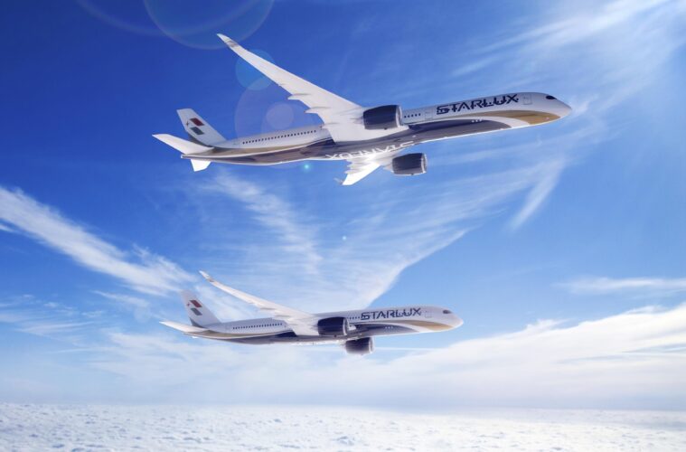 two airplanes flying in the sky
