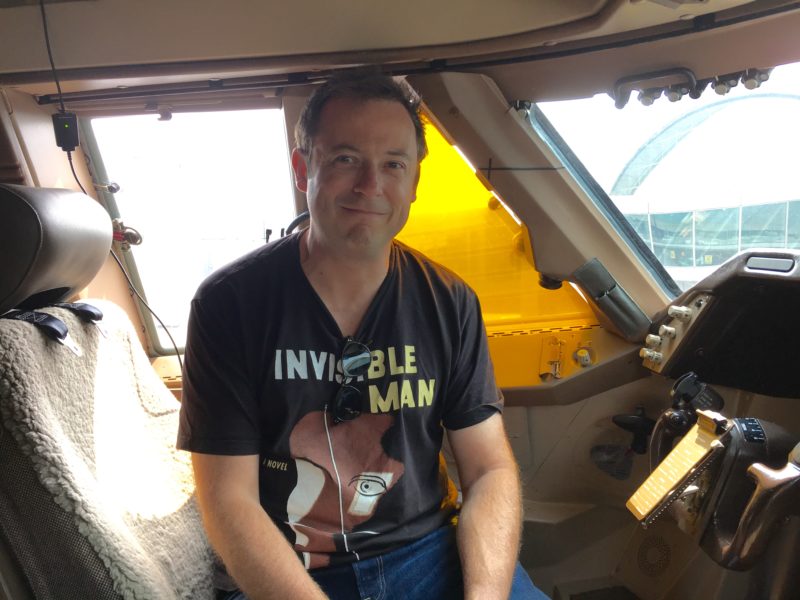a man sitting in a cockpit
