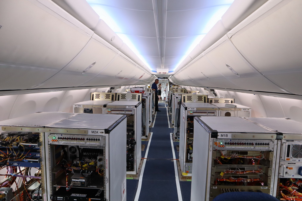 a inside of a plane with many machines