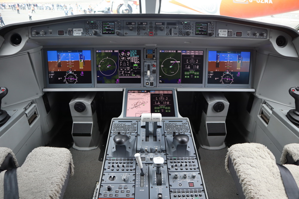 the cockpit of an airplane with control panel and buttons