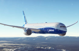 a plane flying over mountains