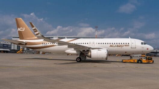 a white airplane on a runway