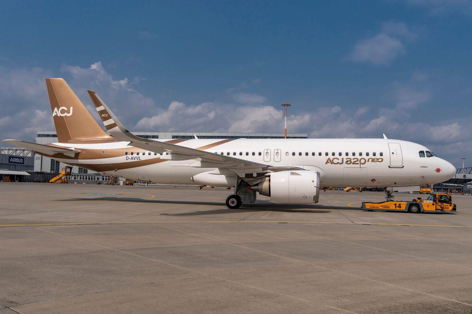 a white airplane on a runway