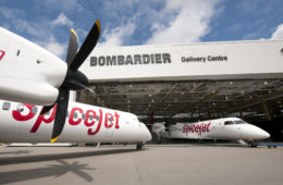 airplanes parked in a hangar