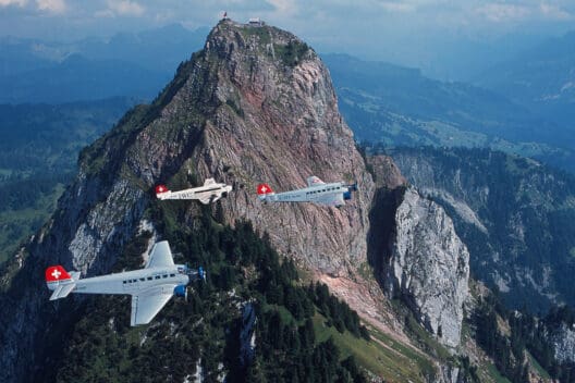 airplanes planes flying over a mountain