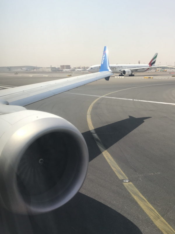 an airplane wing on a runway