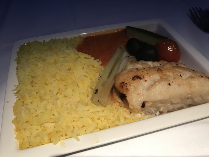 a plate of rice and fish