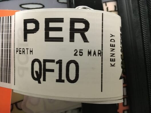 a roll of white paper with black letters and numbers