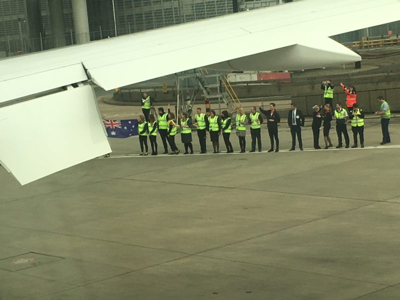 a group of people standing in a line