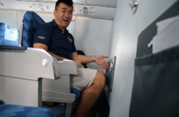 a man sitting in an airplane