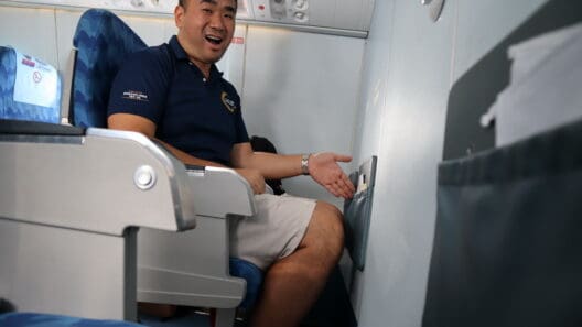 a man sitting in an airplane