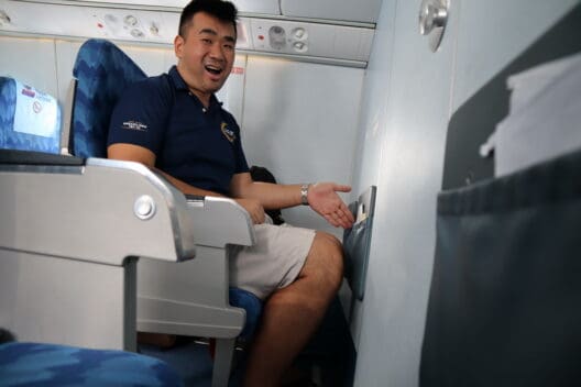 a man sitting in an airplane
