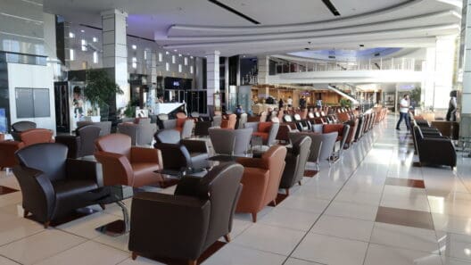 a large room with chairs and tables